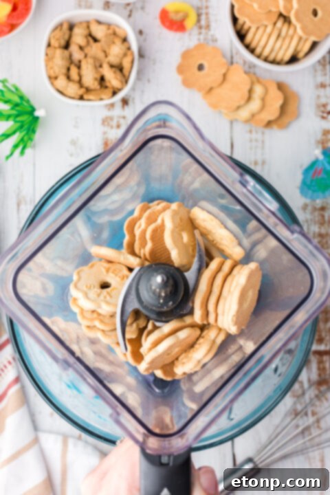 Teddy graham bears enjoying their peach gummy ring floats in a beach pudding cup.