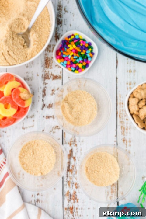 A collection of colorful beach pudding cups, ready for a party.