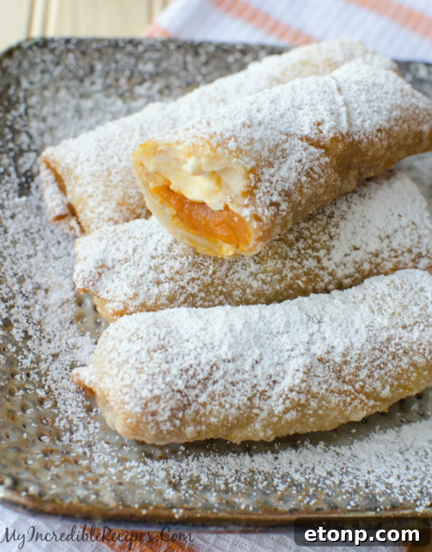 Autumn Pumpkin Cheesecake Rolls 9 Detailed shot of pumpkin cheesecake taquito filling