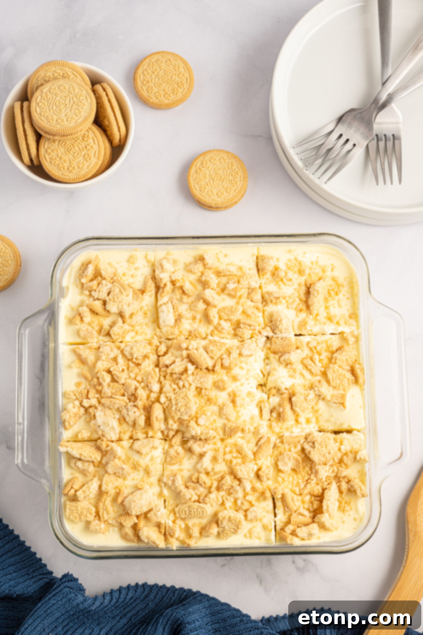 Overhead view of Golden Oreo Icebox Cake in a clear baking dish, ready to be served.