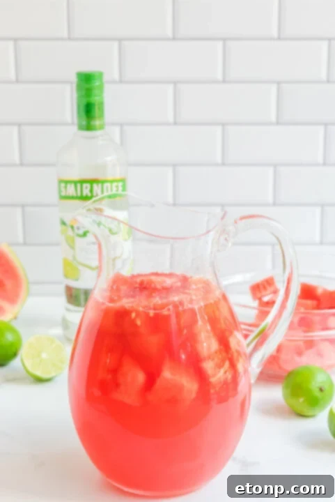 Watermelon and lime slices for garnish.