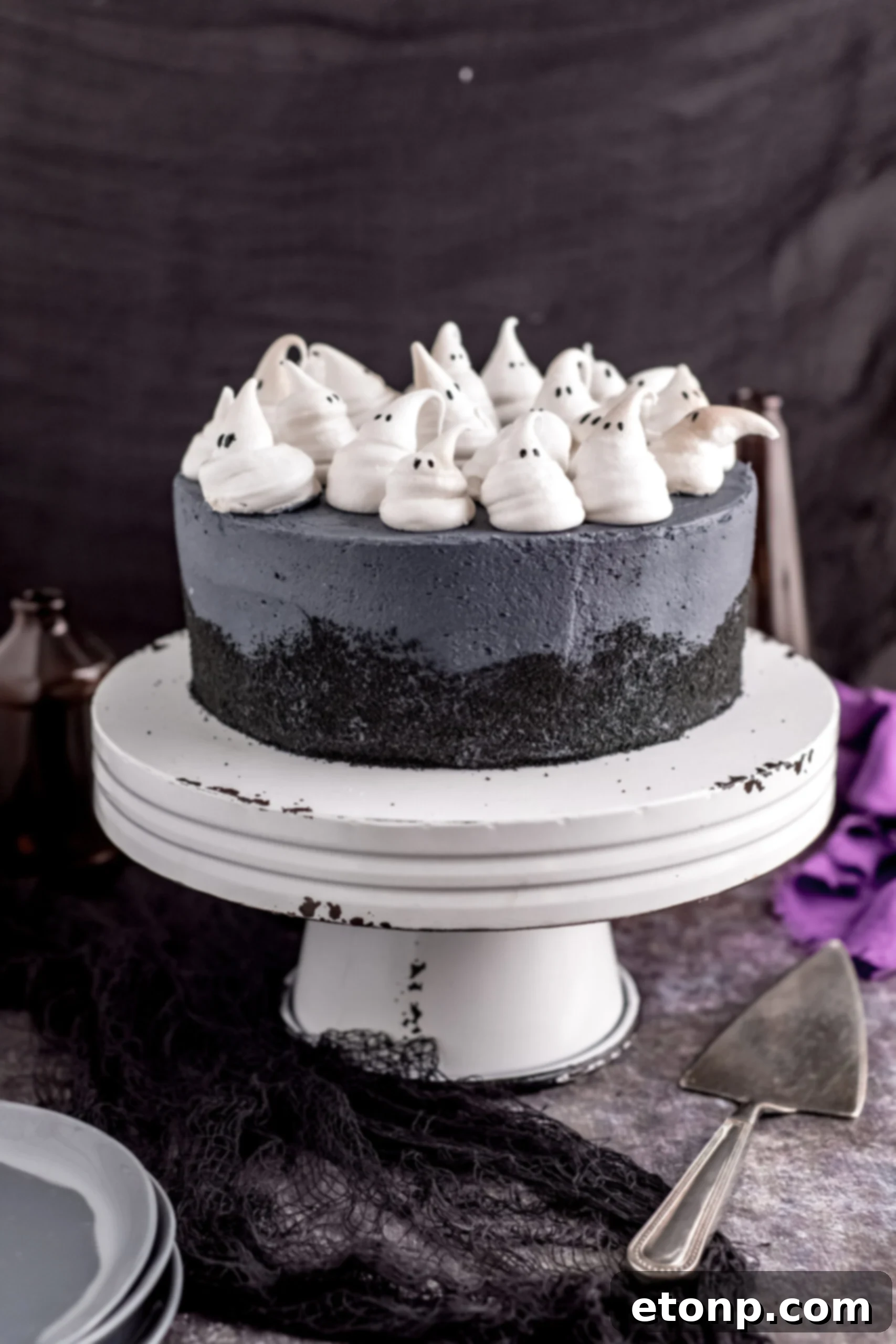 Halloween Cake on a white distressed stand. 