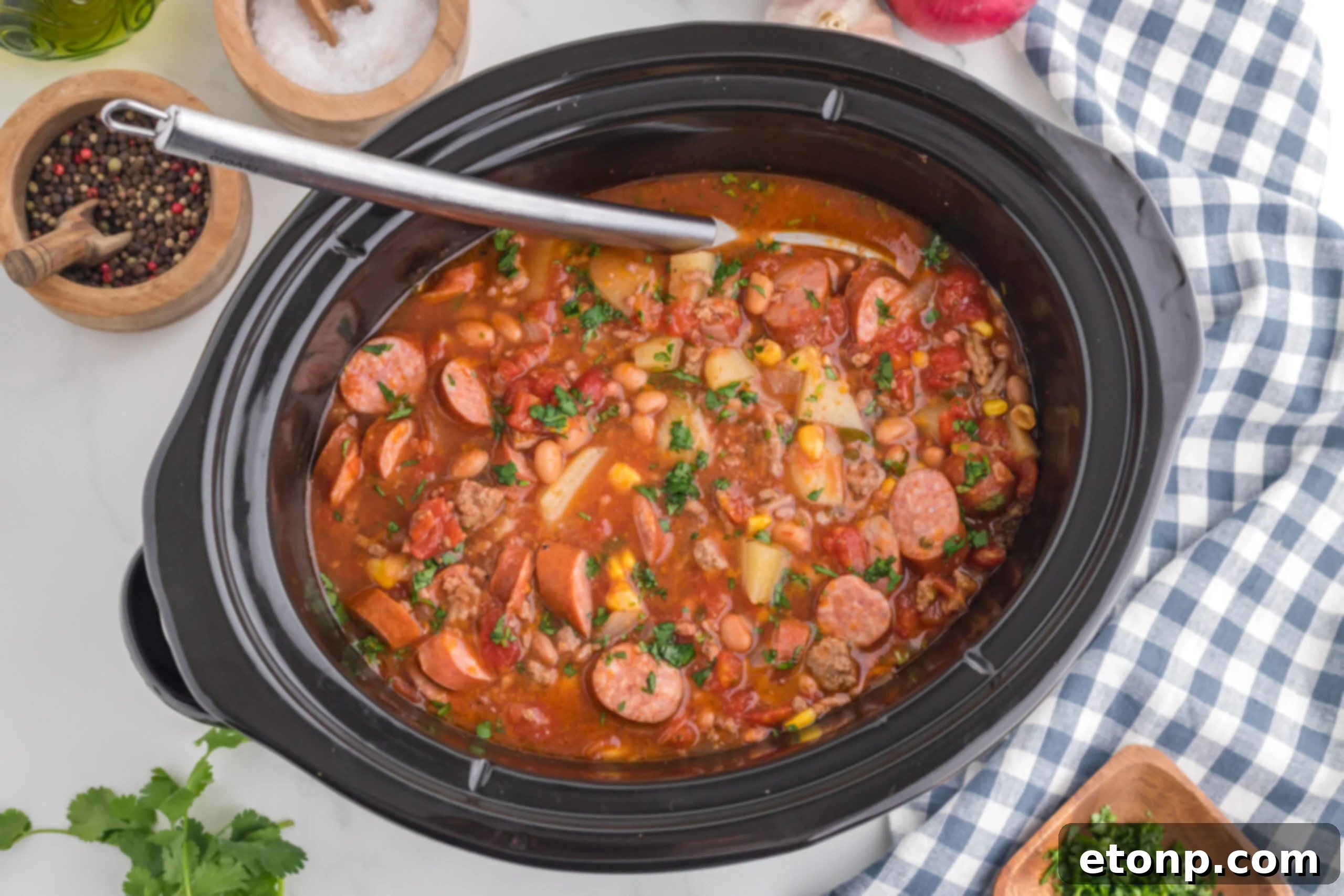 Hearty Lone Star Slow Cooker Stew 3 Overhead view of Slow Cooker Texas Cowboy Stew in a crockpot, ready to be served.