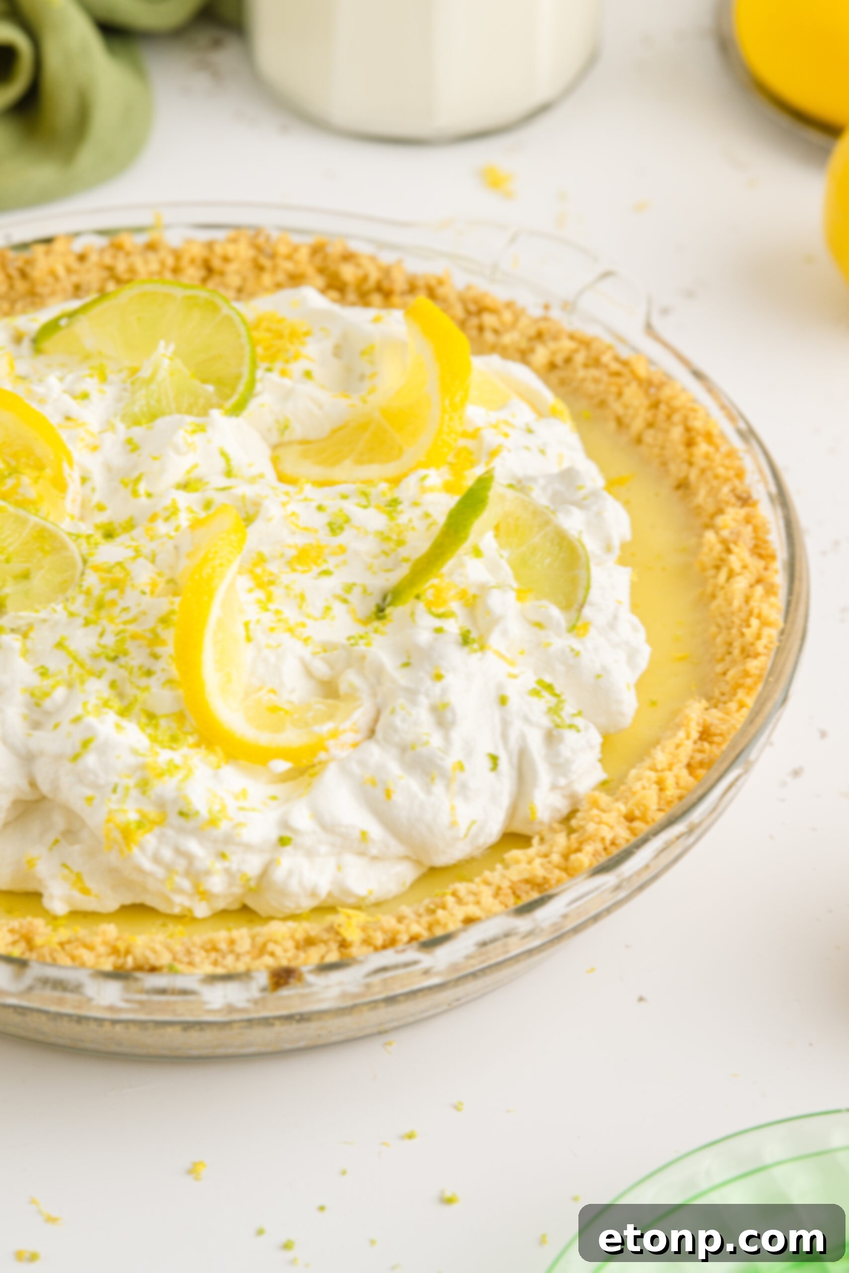 Salty Sweet Coastal Pie 13 Side view of Atlantic Beach Pie topped with fresh lemons and limes.