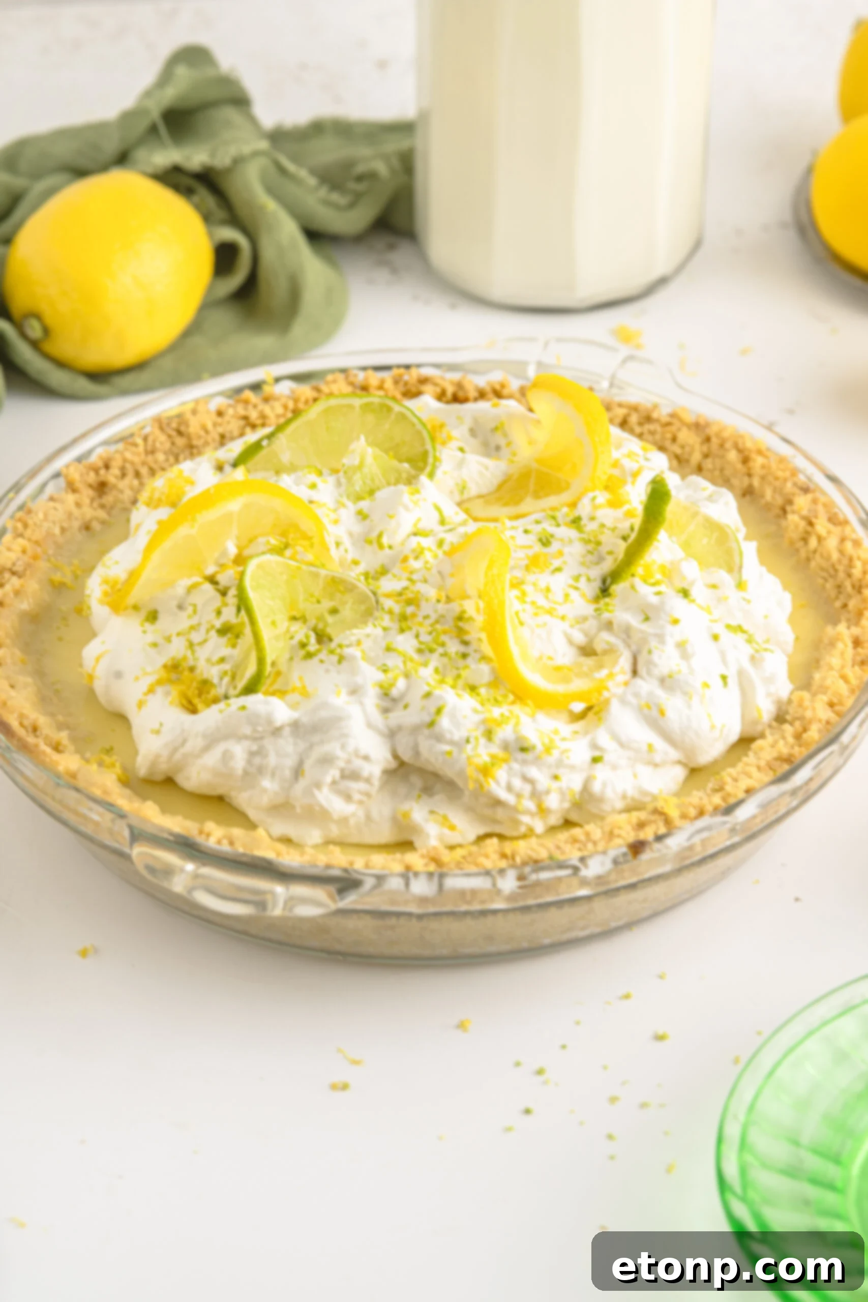Salty Sweet Coastal Pie 4 Side view of Atlantic Beach Pie topped with fresh lemons and limes.