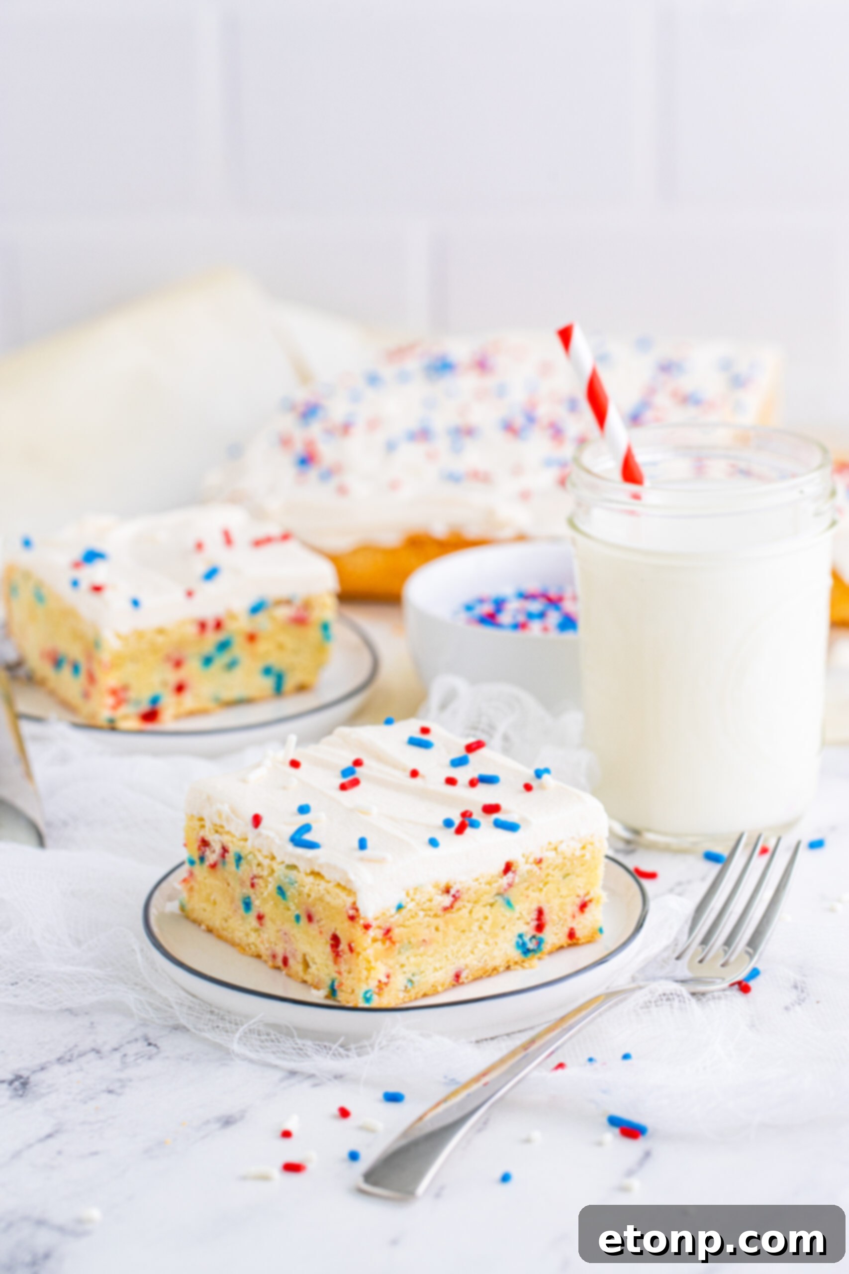 Front view of a Patriotic Sugar Cookie Bar on a white plate.