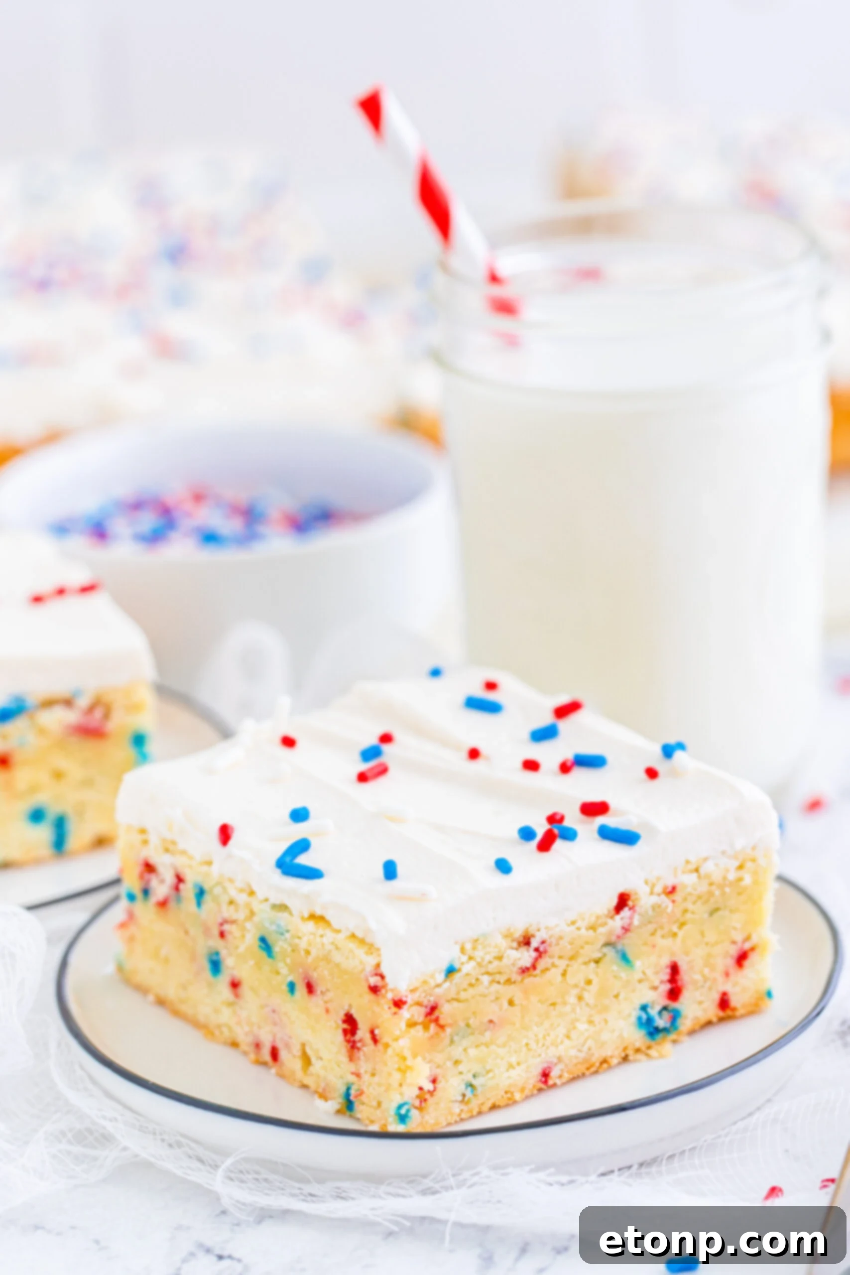 Front view of a Patriotic Sugar Cookie Bar on a white dish.