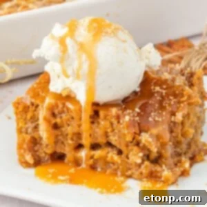 sliced earthquake cake on plate drizzled with caramel and a scoop of ice cream