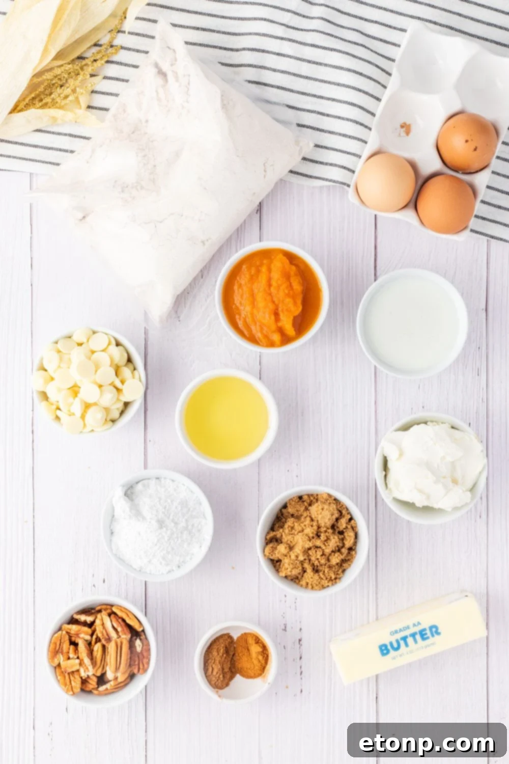 cake mix ingredients in small bowls on white counter
