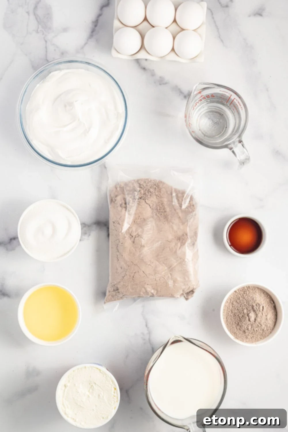 Dolce Vita Cake 5 ingredients for Italian love cake laid out on a marble counter
