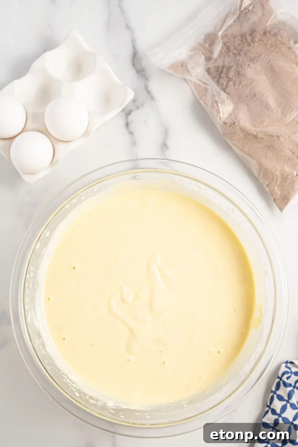 Dolce Vita Cake 8 smooth ricotta batter in a glass bowl