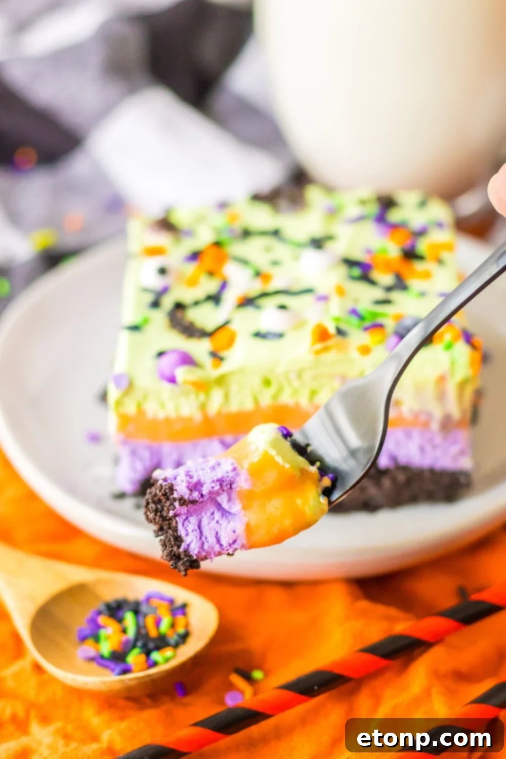 sliced cake on plate with fork bite