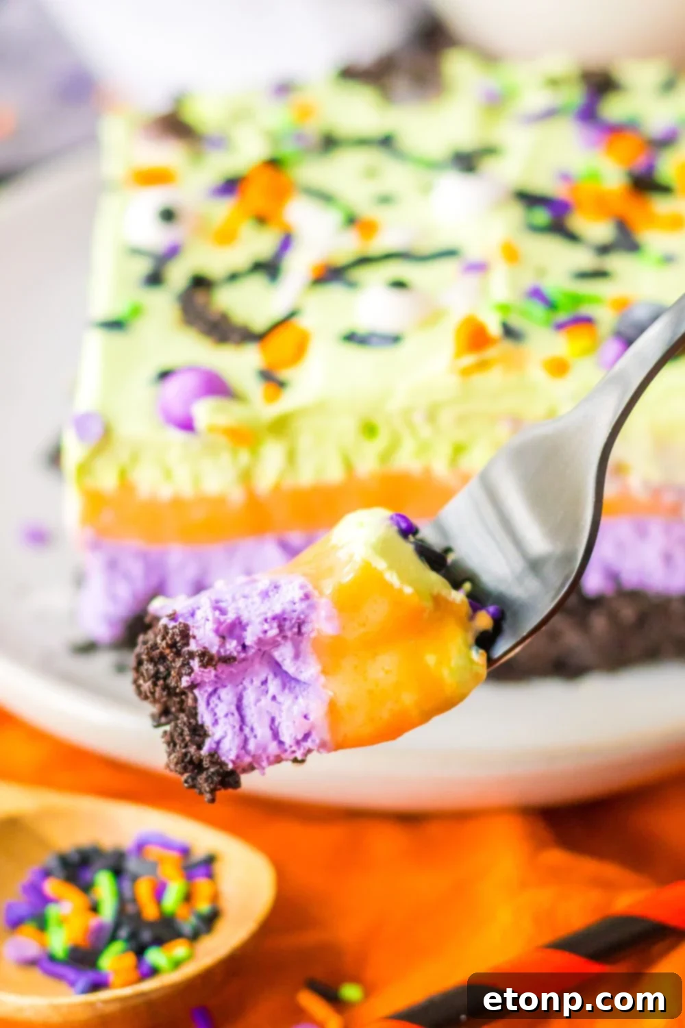 fork with a bite of layered Halloween lush on fork 