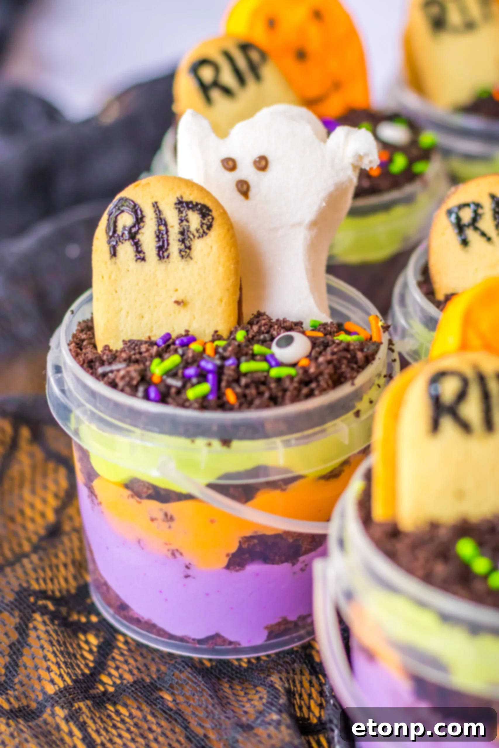close up of dirt cake halloween dessert in a bucket