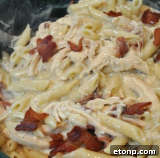 Creamy Smothered Bacon Ranch Chicken Penne Pasta, a hearty and flavorful dish.