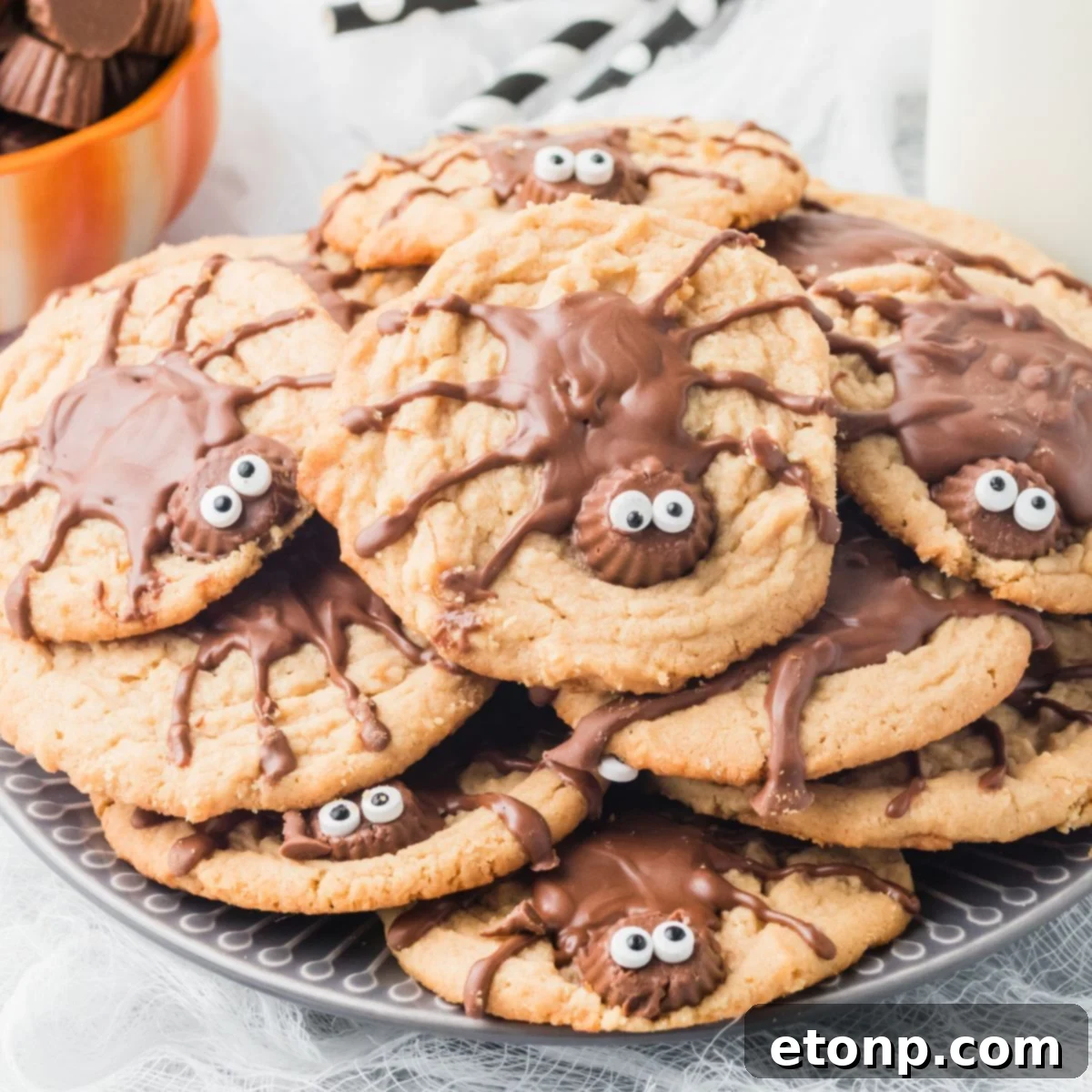 Frightfully Delicious Peanut Butter Spider Cookies 2 Peanut Butter Spider Cookies on a plate stacked up
