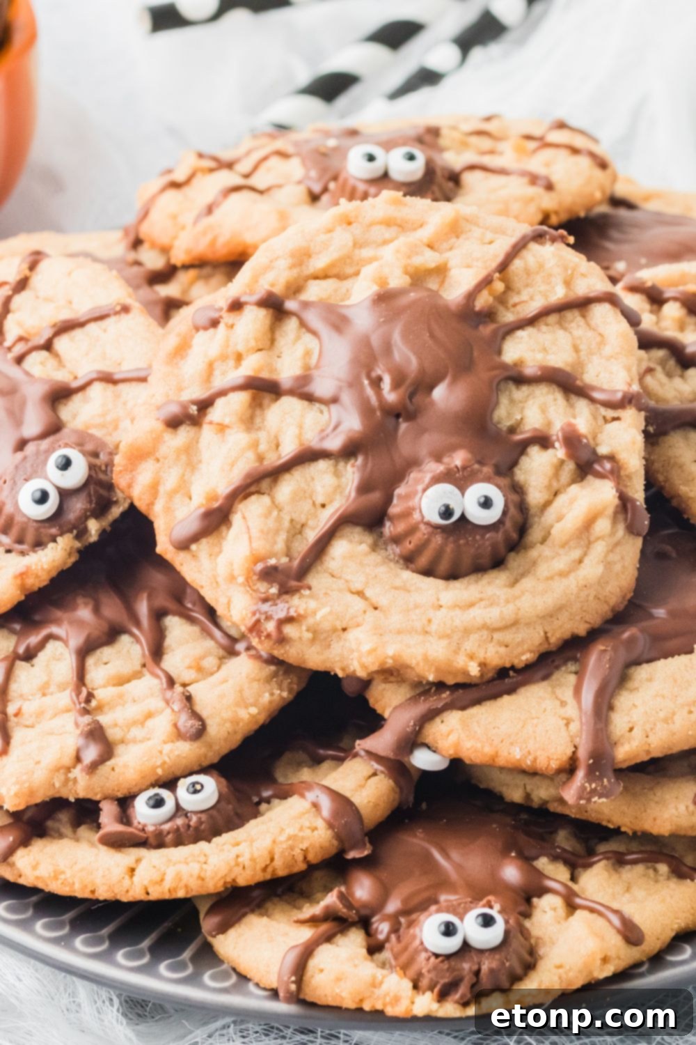 Frightfully Delicious Peanut Butter Spider Cookies 18 cookies stacked on plate