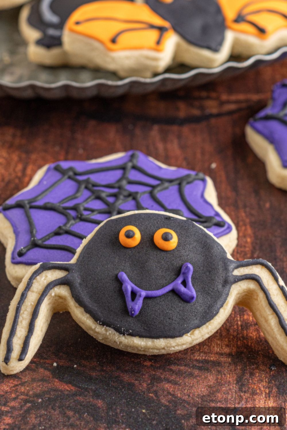 spider and spiderweb cookie on table