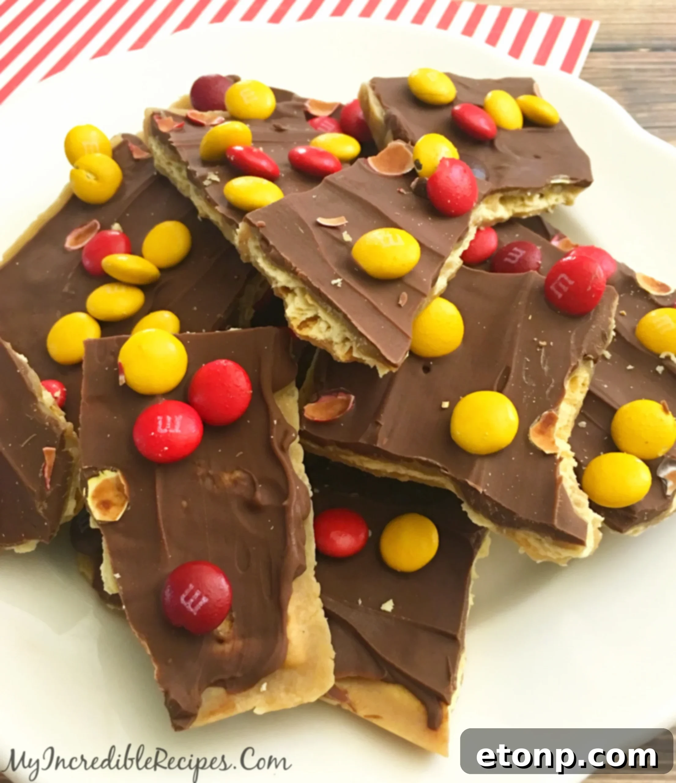 A generous serving of saltine cracker toffee with chocolate and candy, perfect for sharing