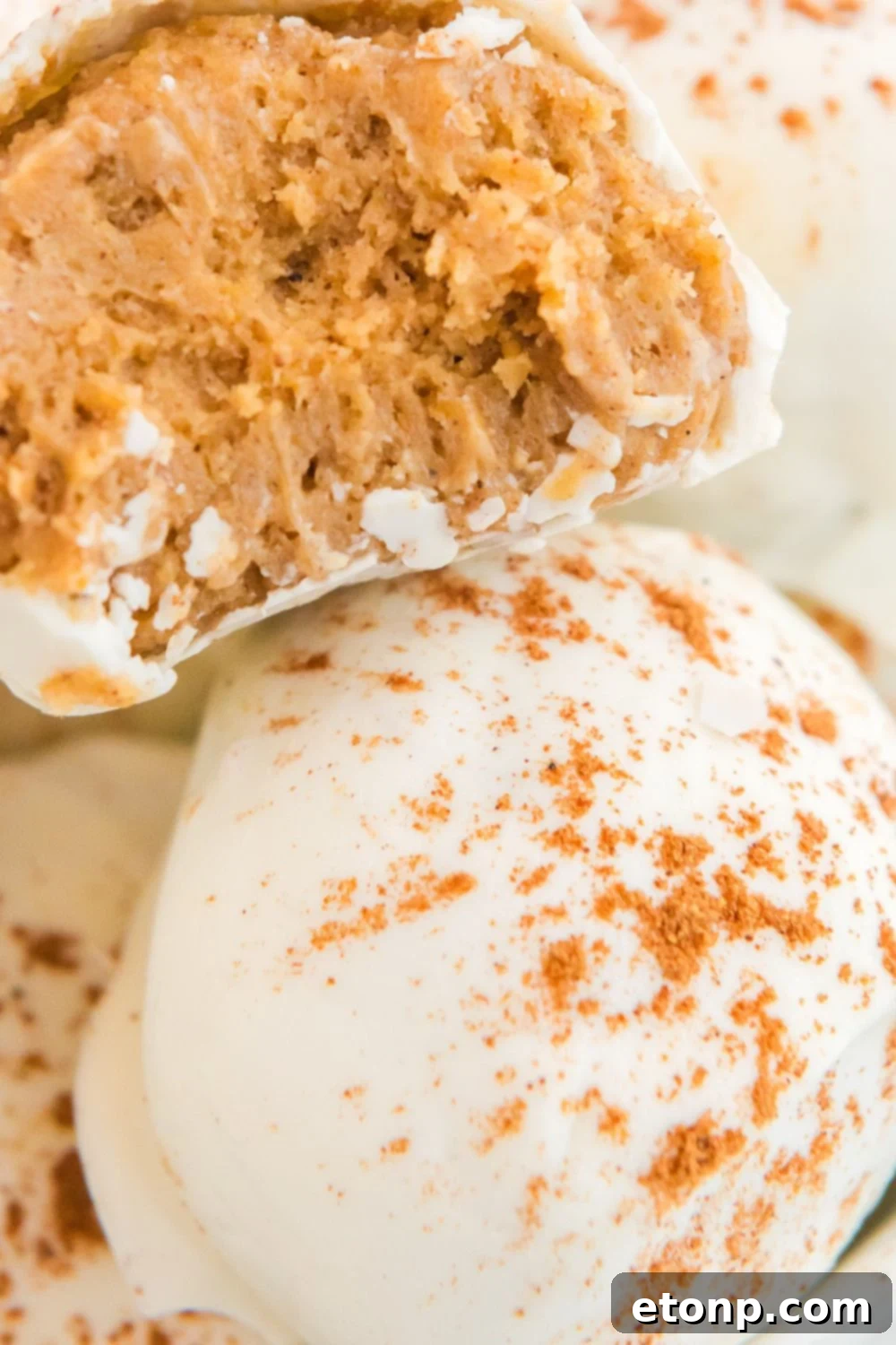 A generous serving of pumpkin cheesecake bites beautifully arranged in a bowl, ready to be enjoyed.