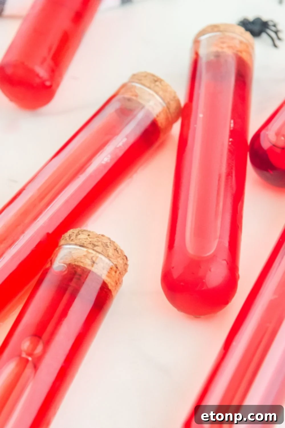 test tube drinks spread out on table