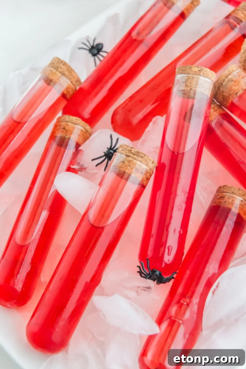 Halloween red colored shots in test tubes on ice cube tray