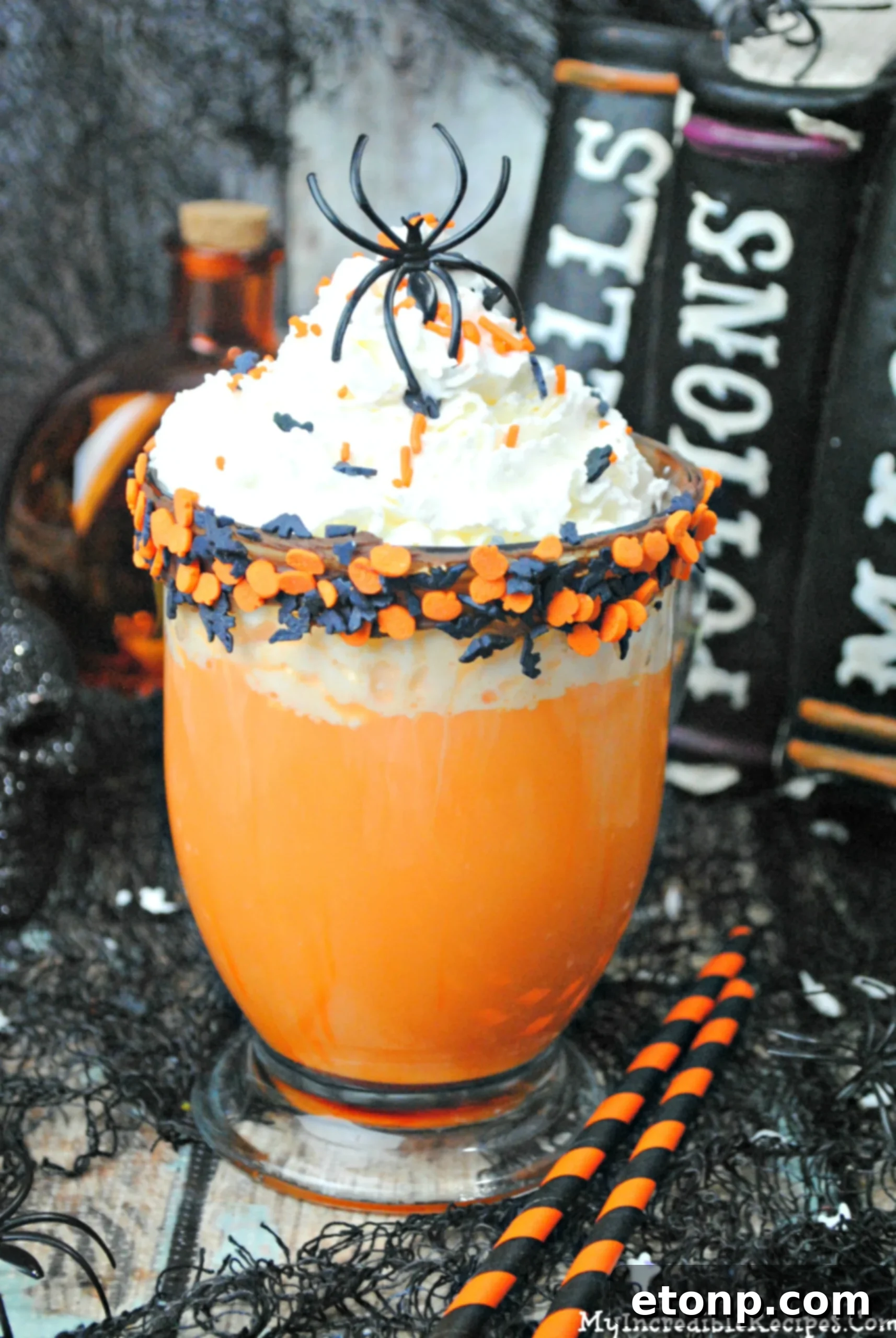 The Ultimate Slow Cooker Halloween Hot Chocolate 7 Kids enjoying Halloween hot chocolate with spooky decorations