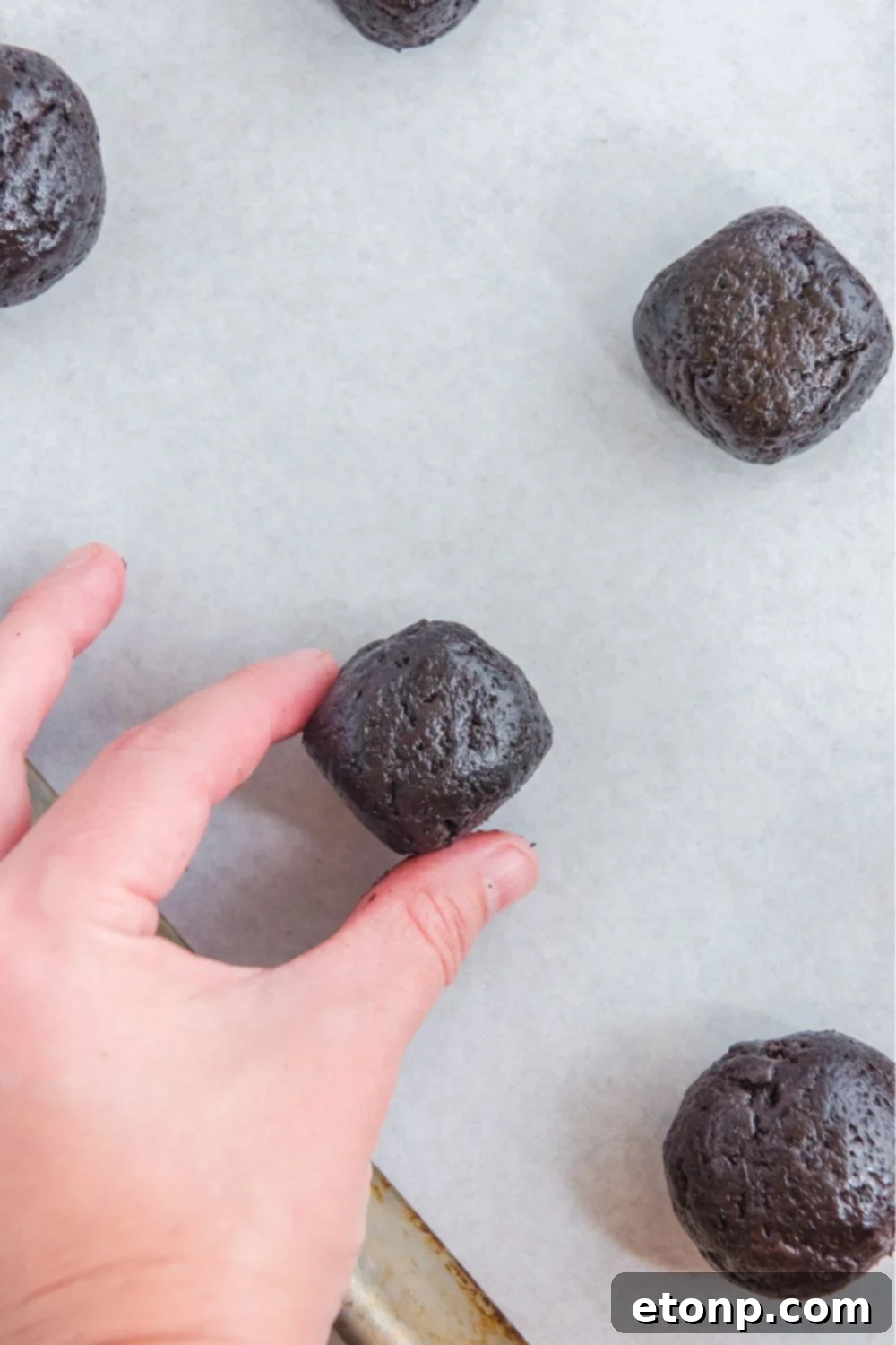 shaping a halloween truffle into a square 