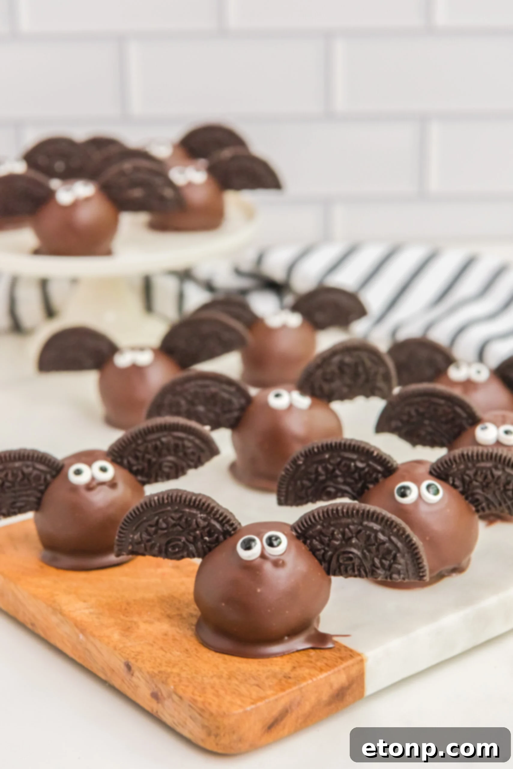 Bat Oreo Truffles on a counter, beautifully arranged for Halloween