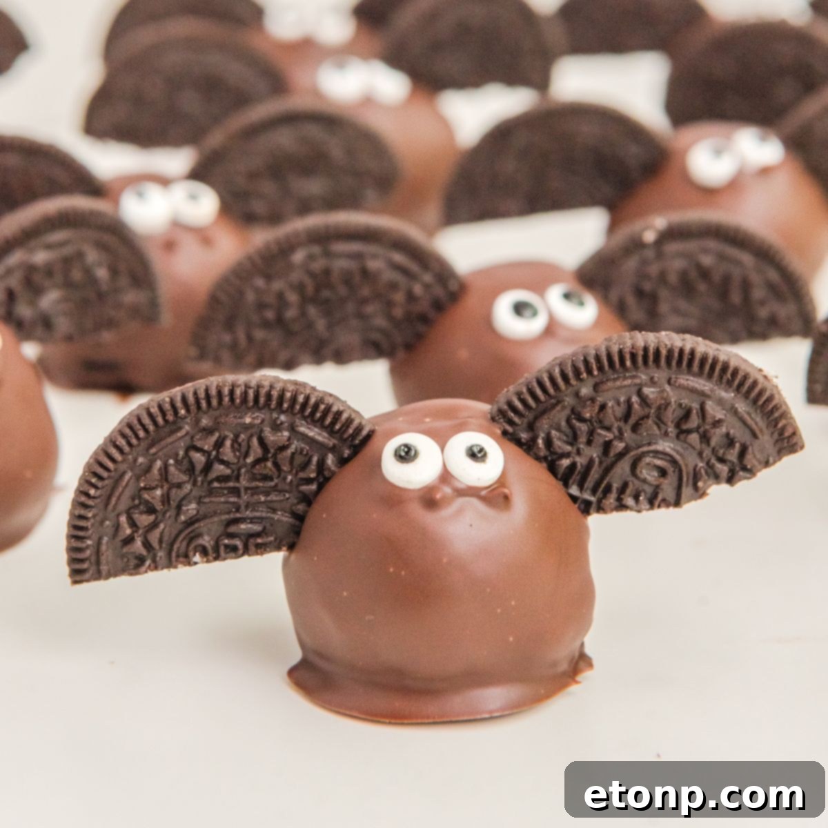 Several Bat Oreo Truffles neatly placed on a counter, ready for serving