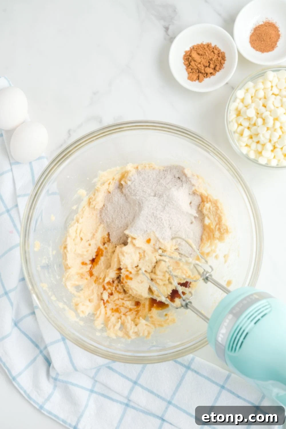ingredients for cookies mixing in a glass bowl 