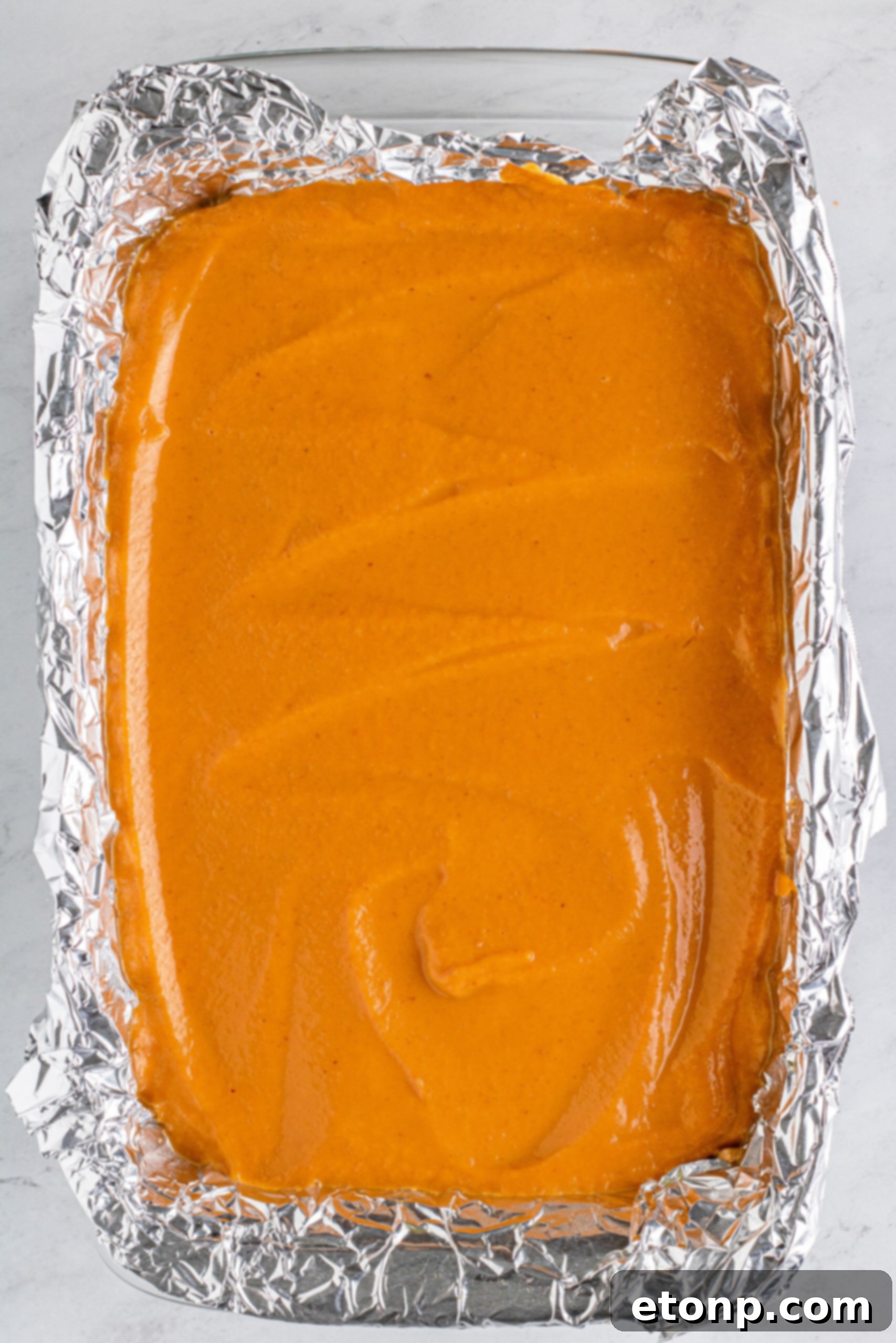 Sweet Autumn Pumpkin Crumble Bars 12 Pumpkin batter spread in pan