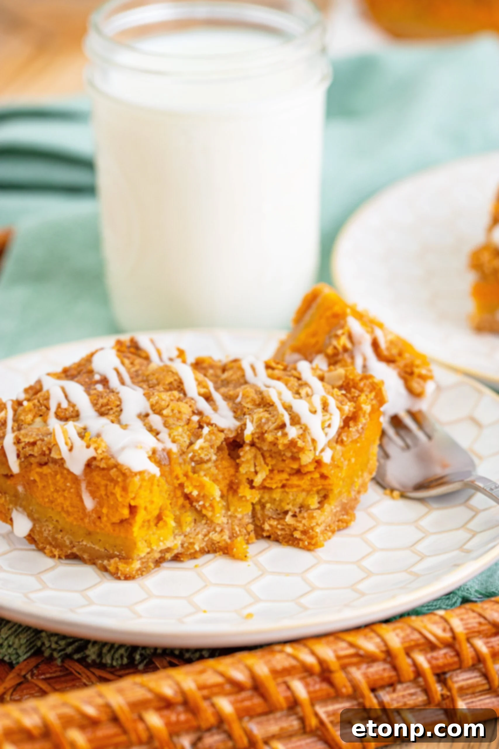 Sweet Autumn Pumpkin Crumble Bars 15 Streusel bar on table with some on a fork