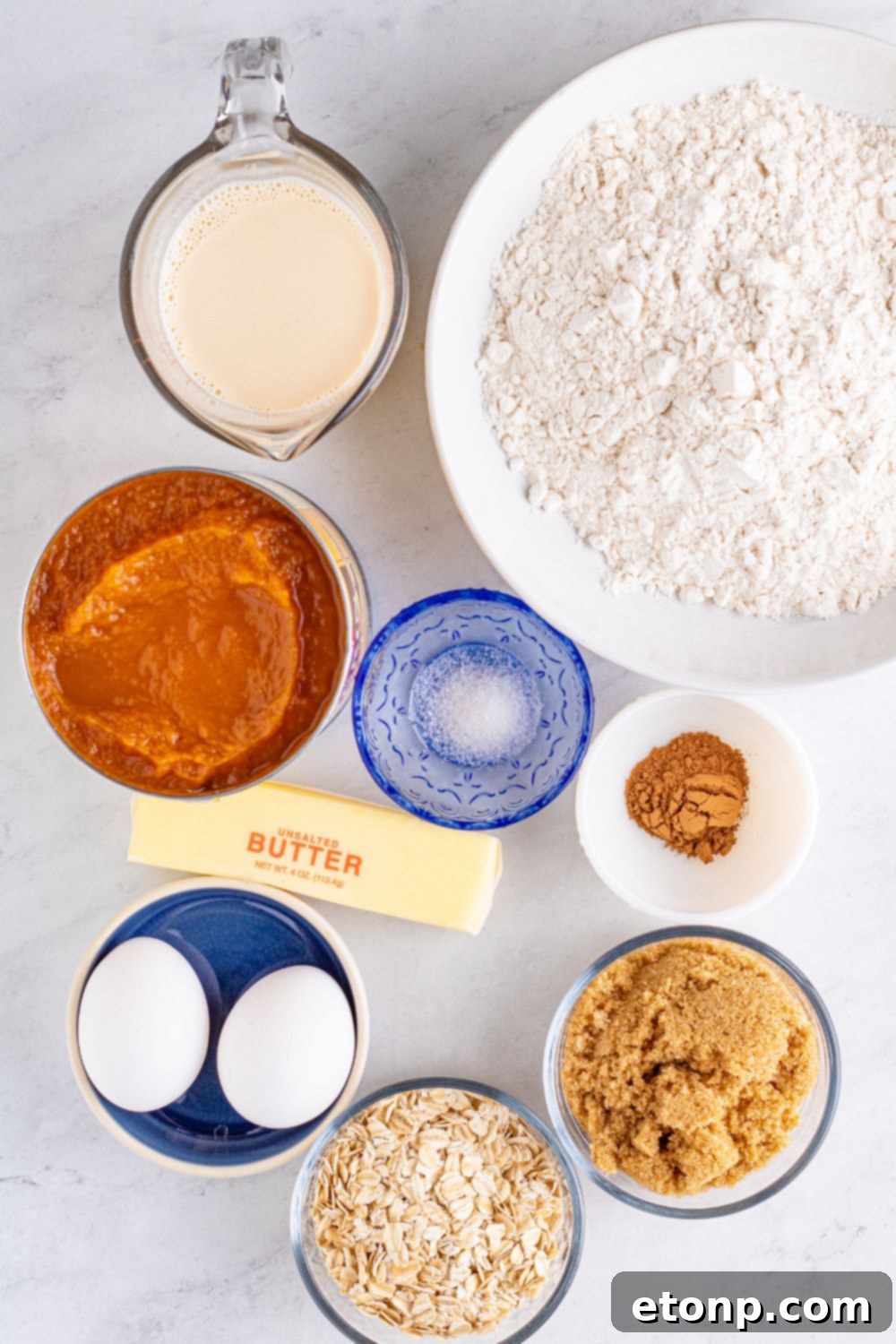 Sweet Autumn Pumpkin Crumble Bars 6 Pumpkin dessert with all ingredients in bowl sitting on marble counter