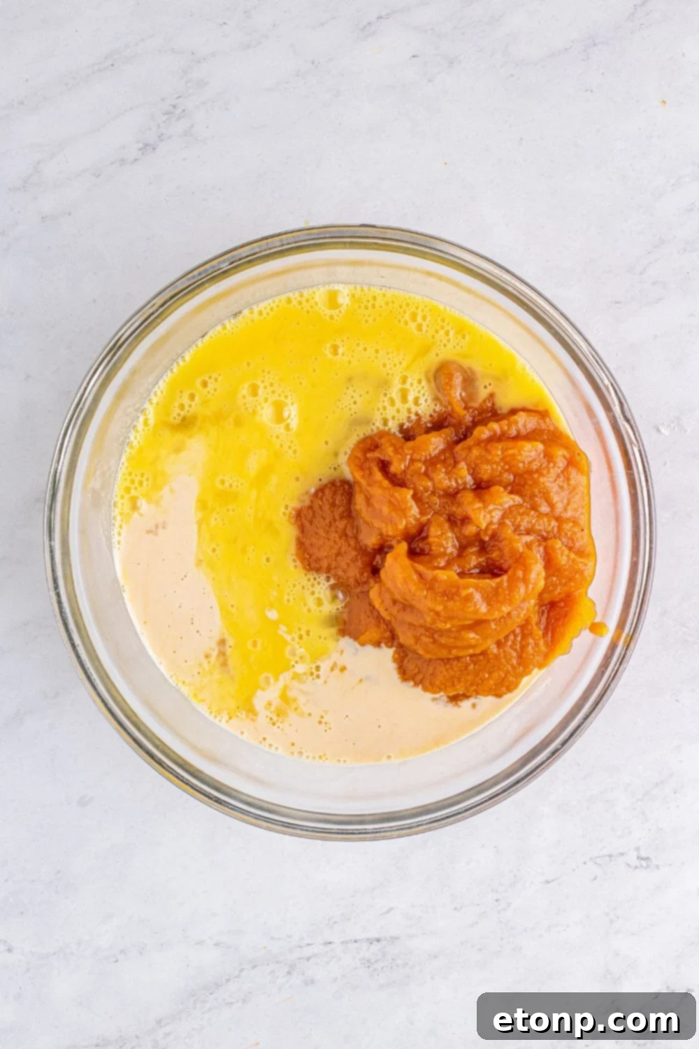 Sweet Autumn Pumpkin Crumble Bars 8 Pumpkin bar ingredients in a glass bowl