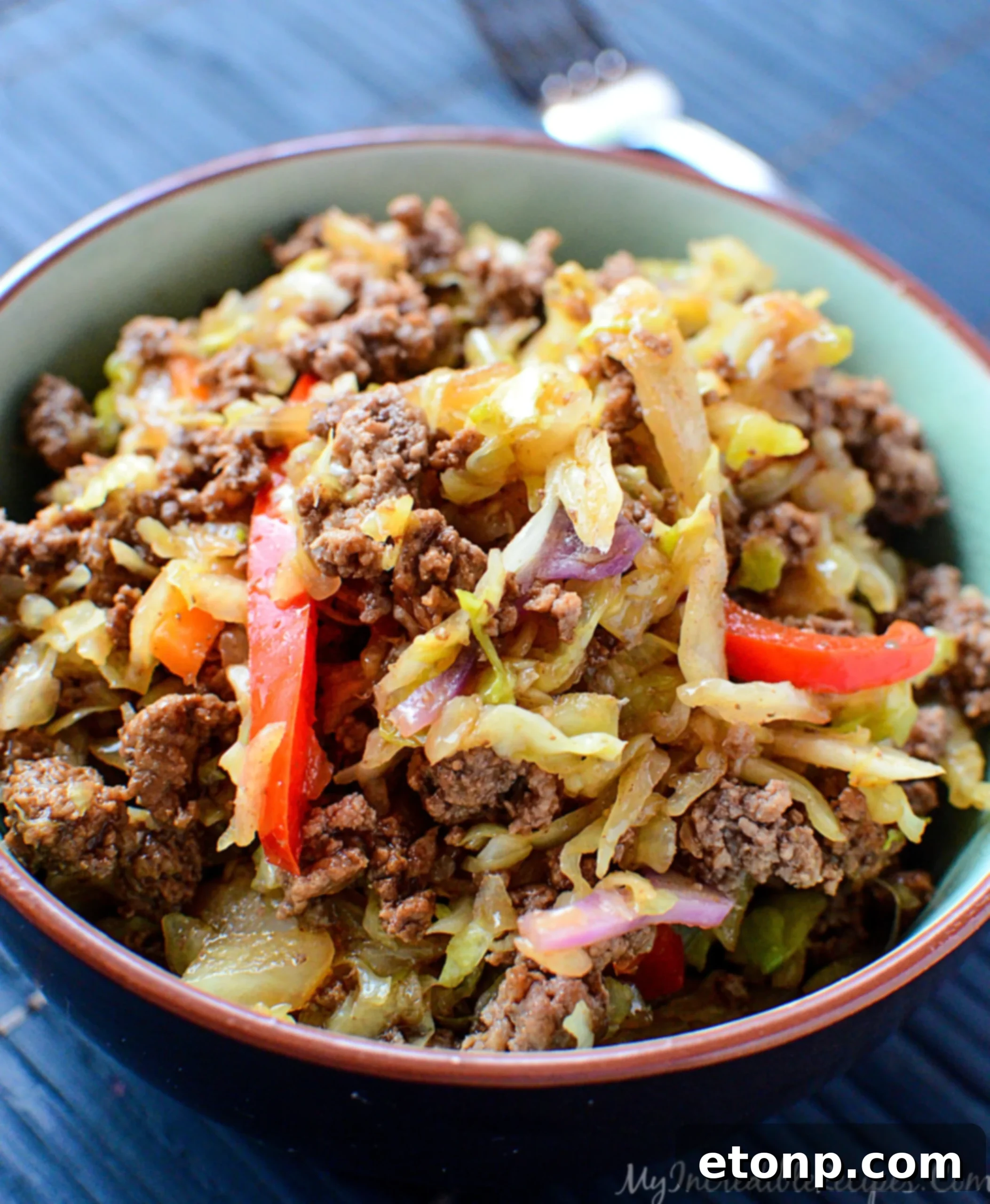 The finished stir fry, glistening with a delicious sauce