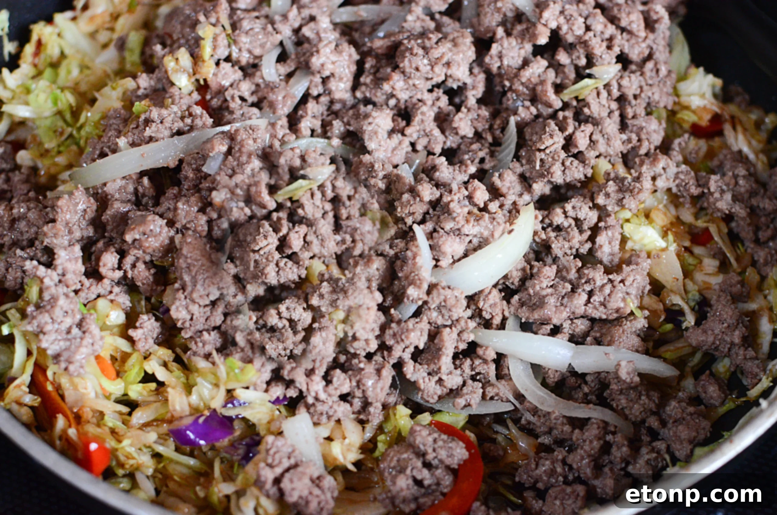 Ingredients laid out for a simple beef and cabbage stir fry recipe