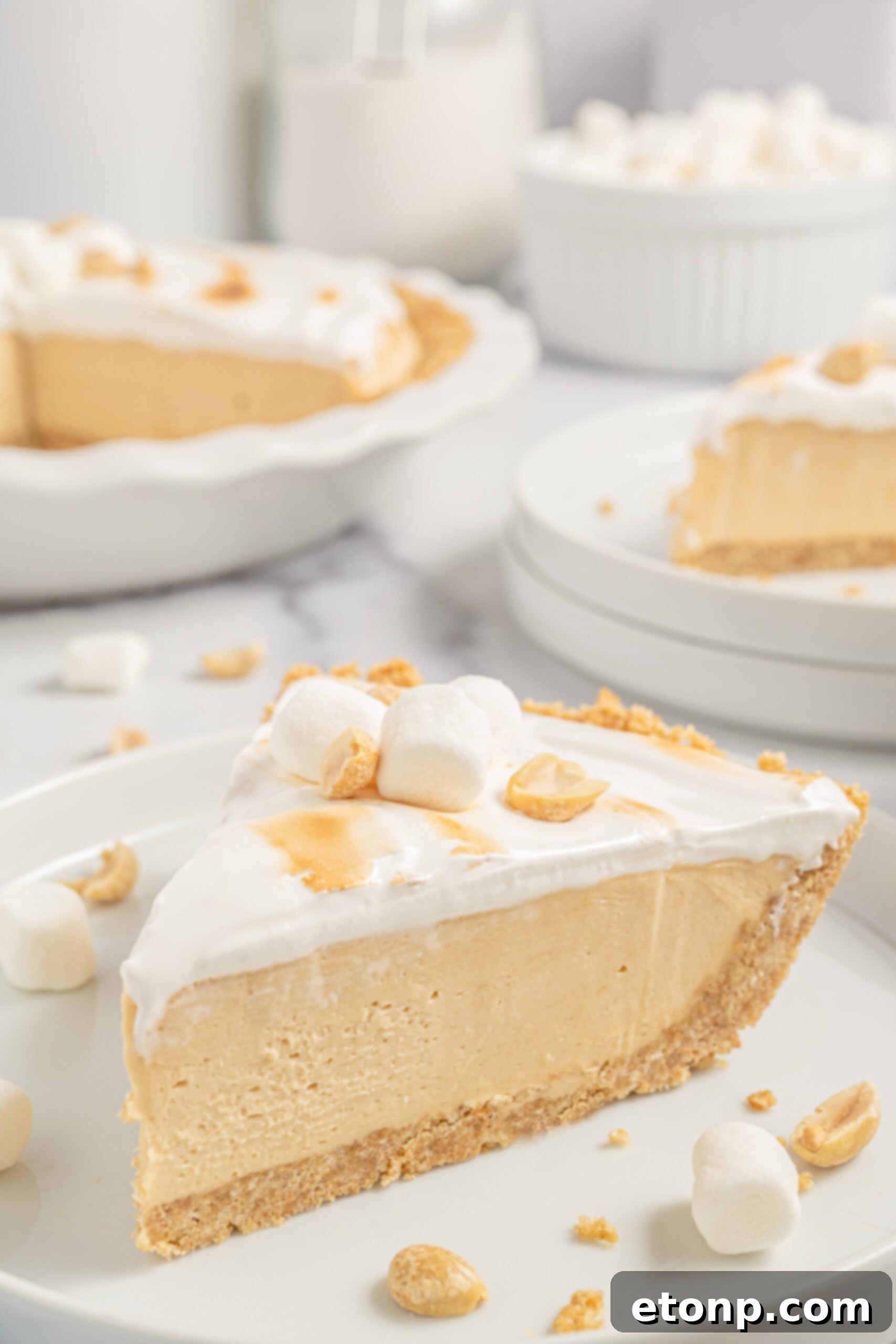 Fluffernutter pie slice up close from the side showing the creamy texture and layers