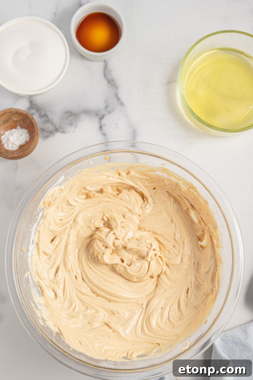 Creamy peanut butter pie filling in a glass bowl