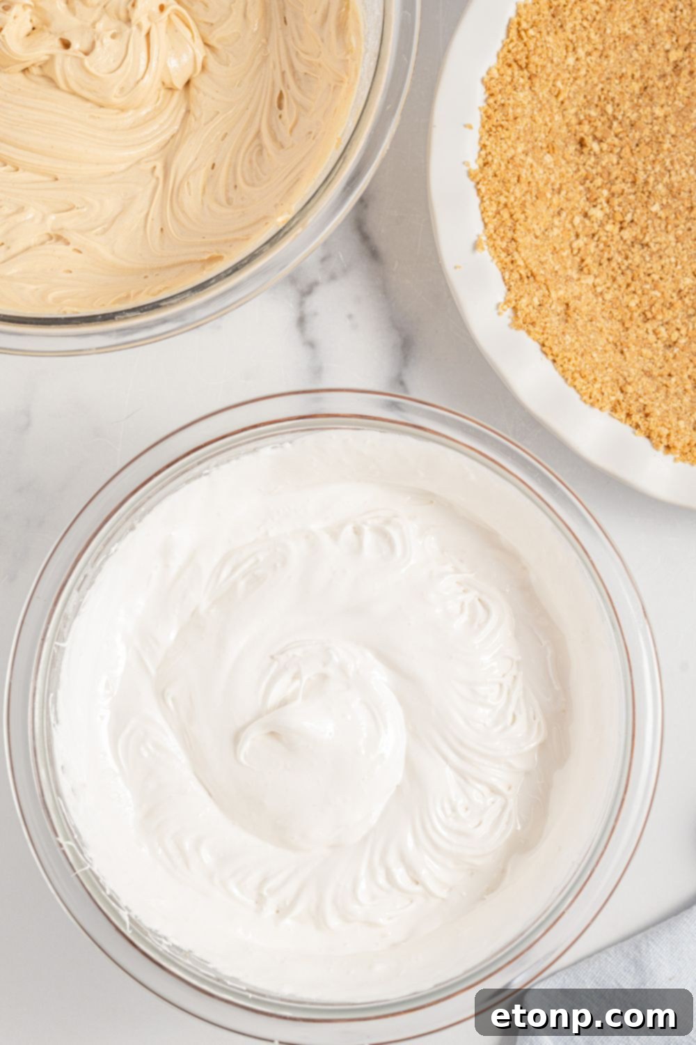 Glossy, stiff meringue in a mixing bowl