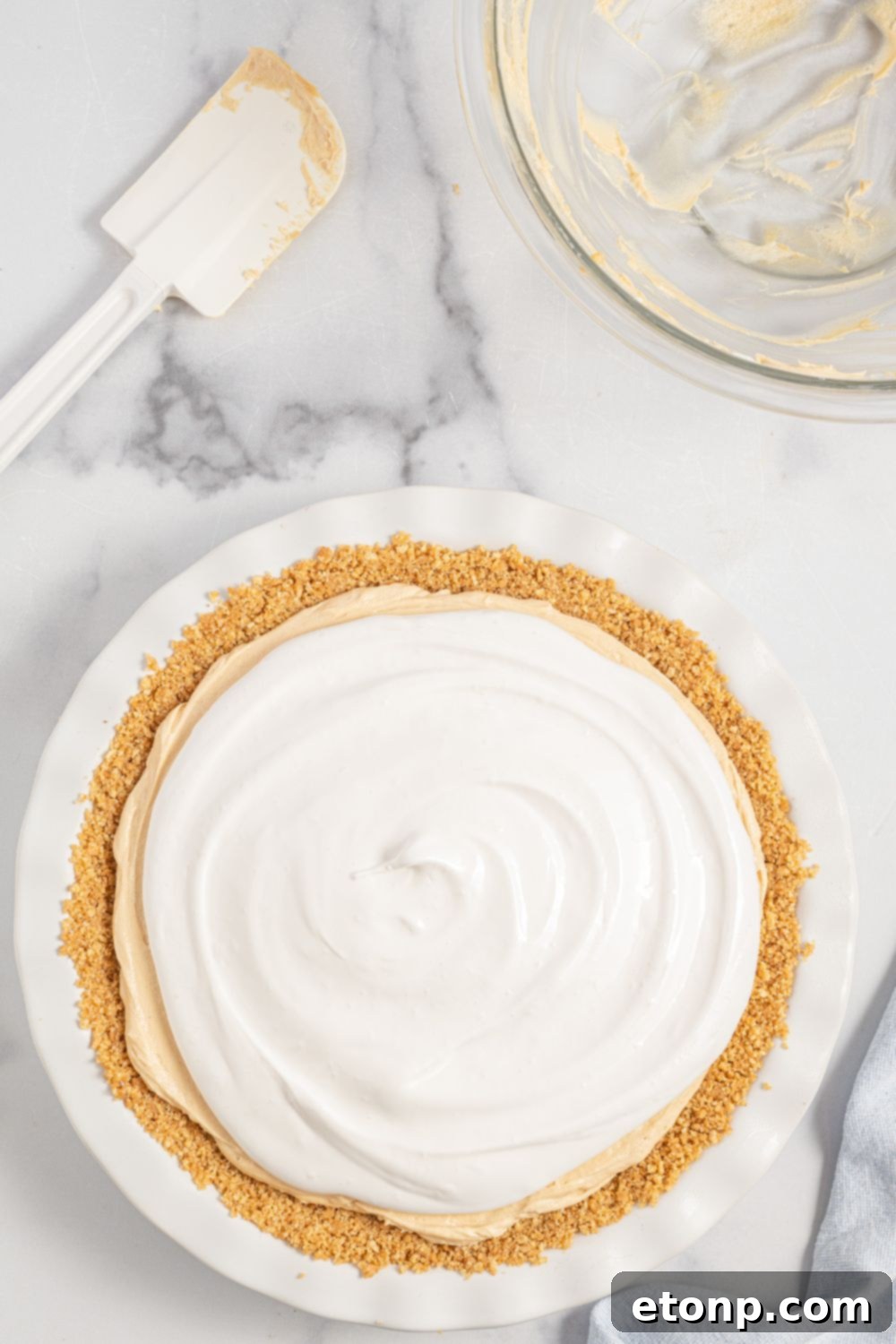 Fluffernutter Pie topped with a beautiful, swirled meringue
