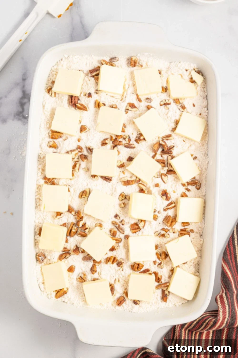 Pumpkin Streusel Cobbler 12 butter sliced and spread over the top of the cake