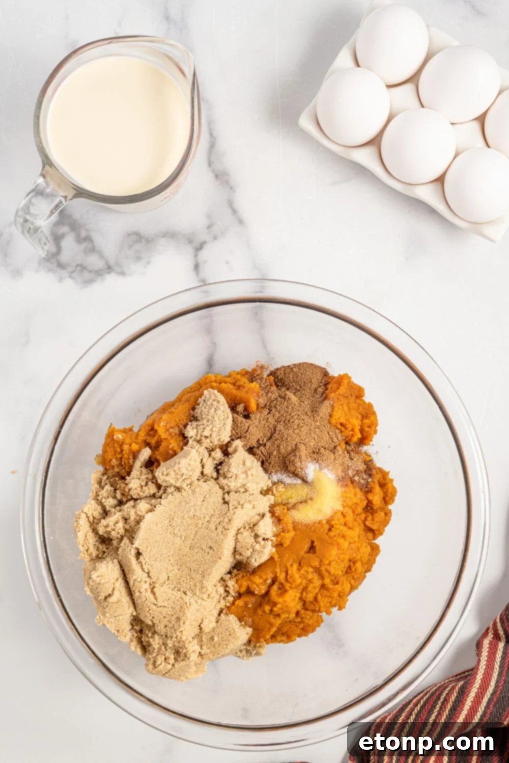 Pumpkin Streusel Cobbler 7 pumpkin puree, brown sugar and spices in a bowl
