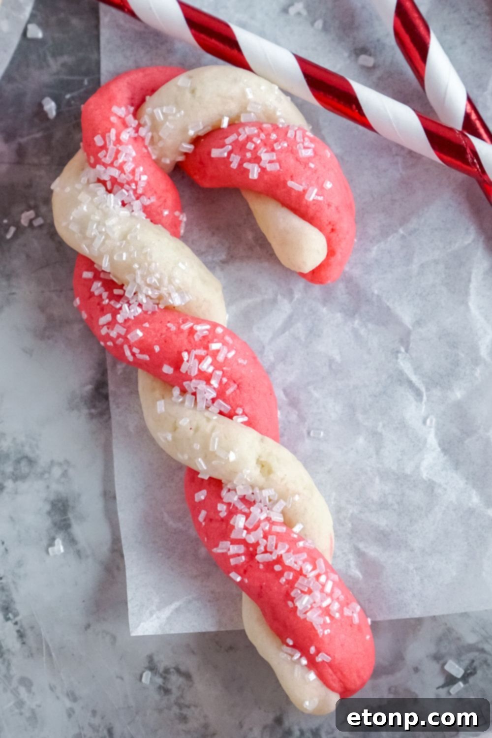 Sweet Peppermint Swirls 15 Candy cane chocolate cookies on a table, perhaps with a chocolate drizzle