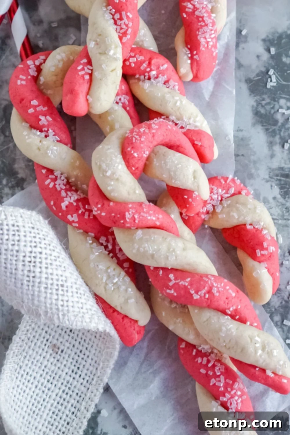 Sweet Peppermint Swirls 20 Christmas cookies artfully arranged on a marble counter