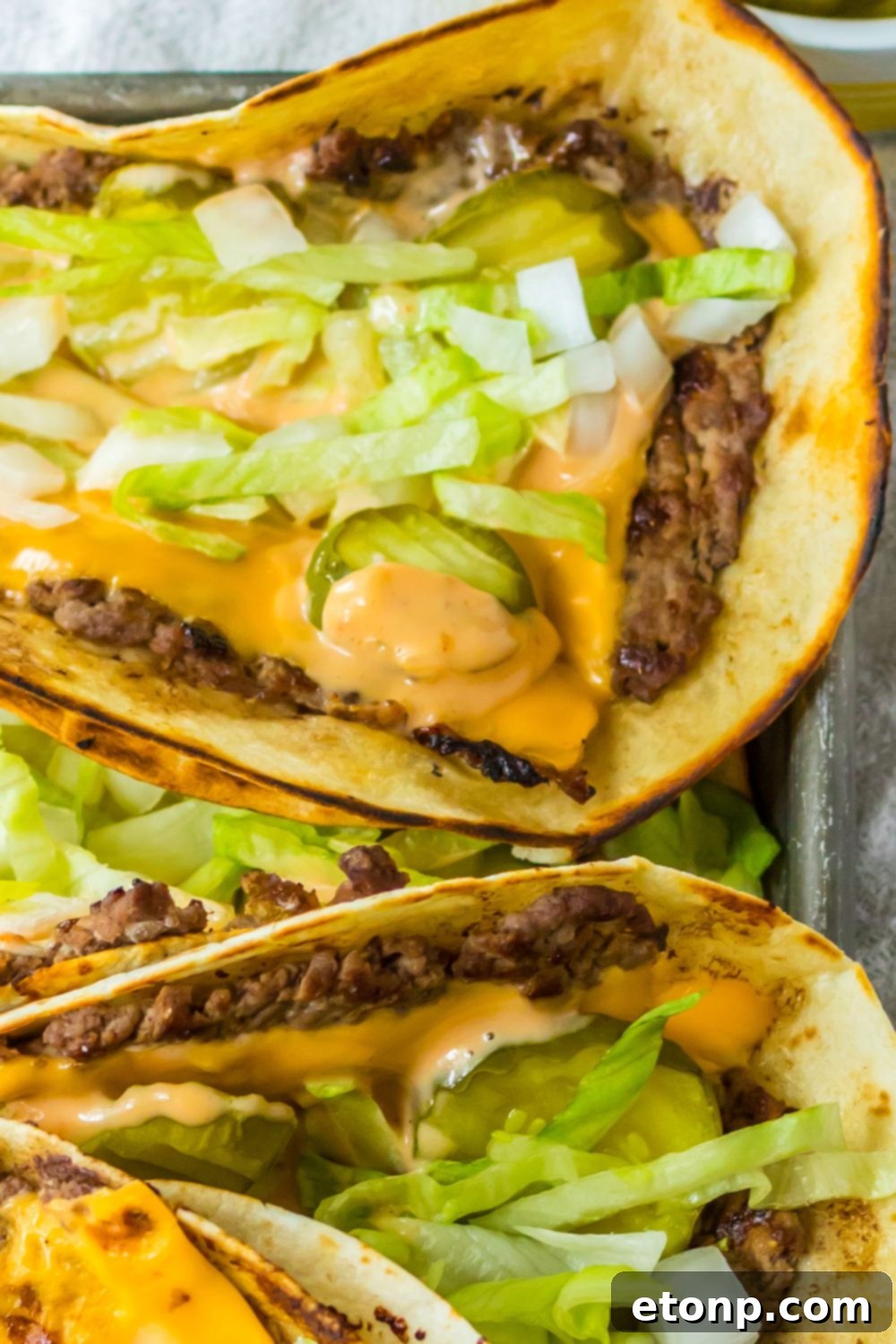 Overhead image of assembled Big Mac smash tacos