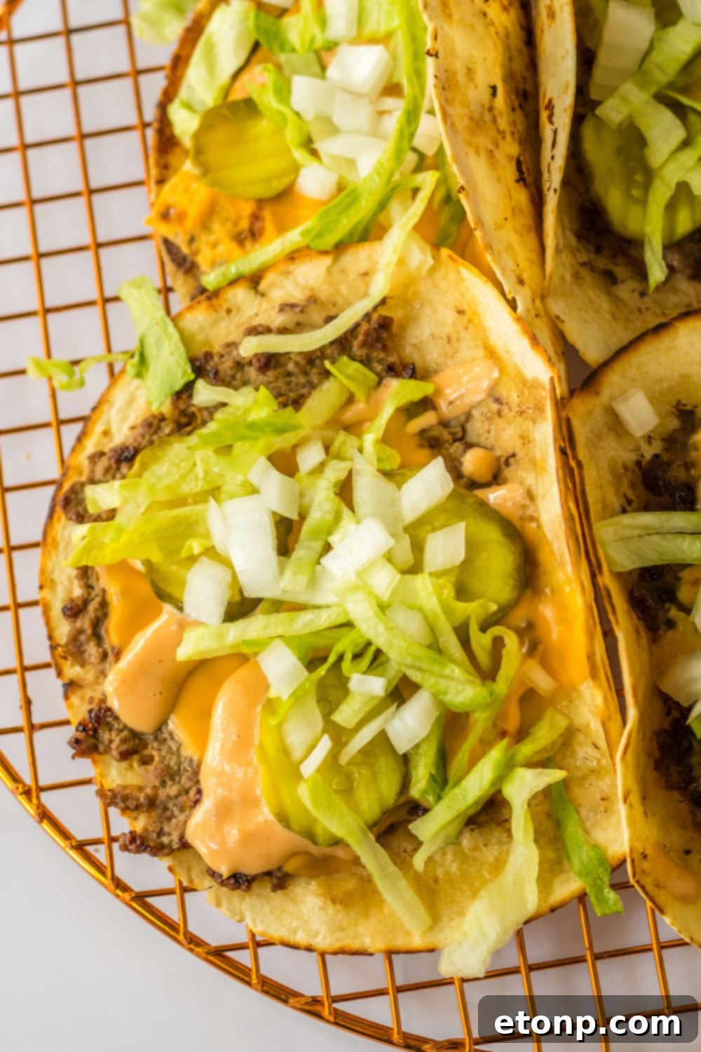 Overhead shot of assembled Big Mac style tacos