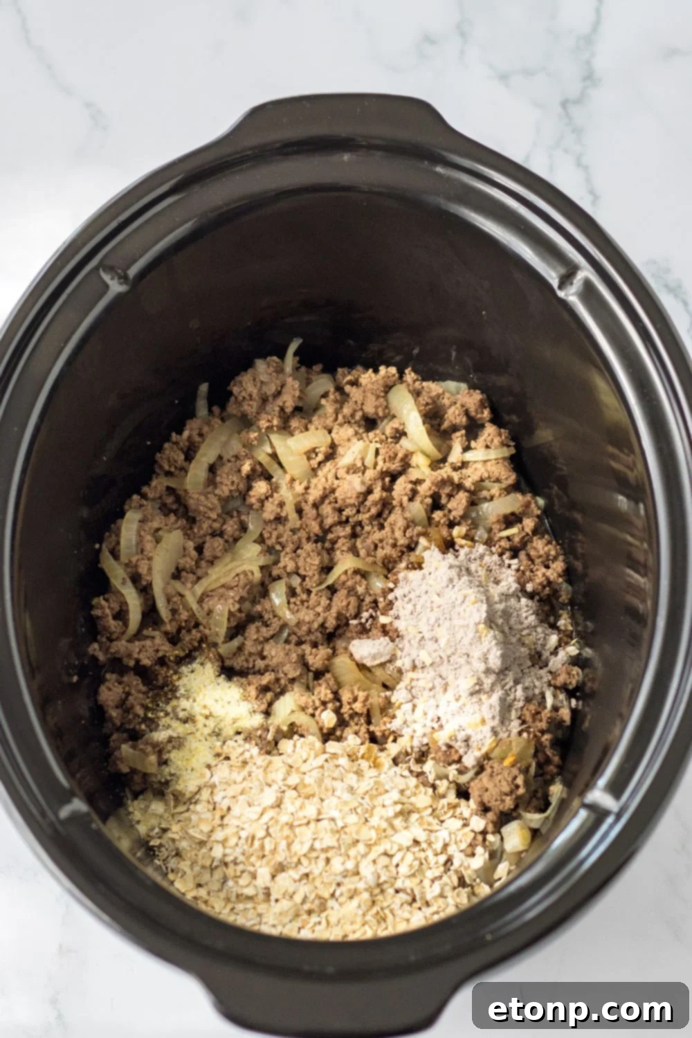 french dip sandwich filling in a slow cooker 
