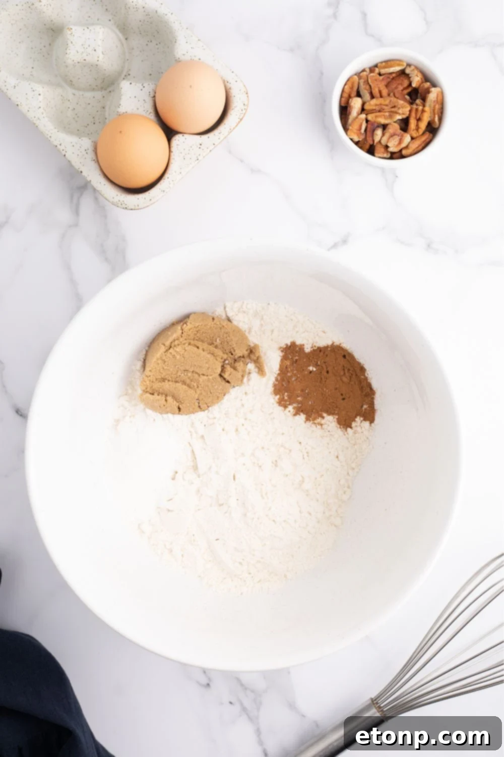 Dry ingredients for pancakes in a mixing bowl