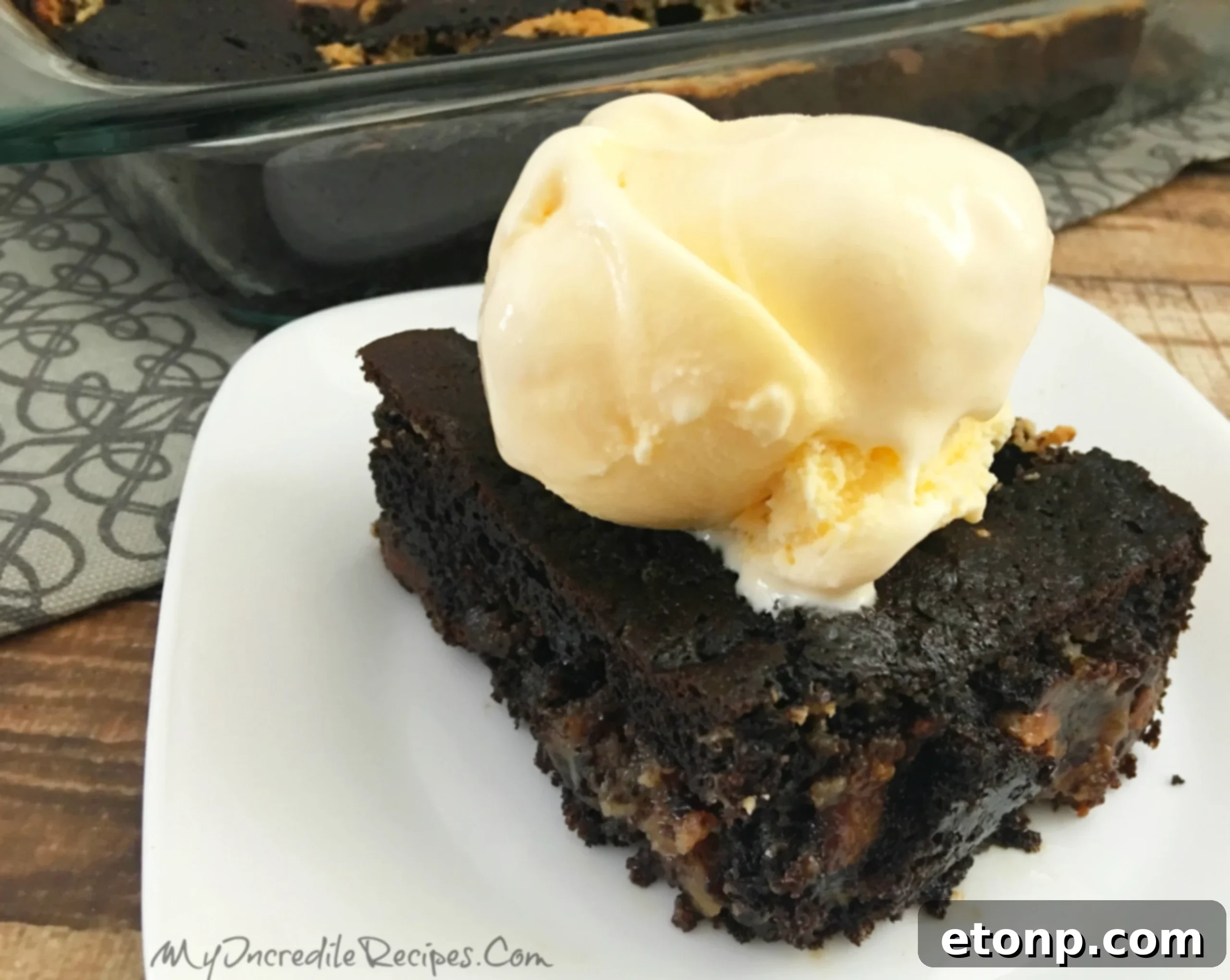 Another angle of the Earthquake Cake with ice cream, showcasing the rich texture and delicious appeal
